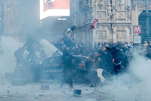 Protesters gather to demonstrate against the high cost of living, in Milan Saturday Oct. 17, 2026. 

