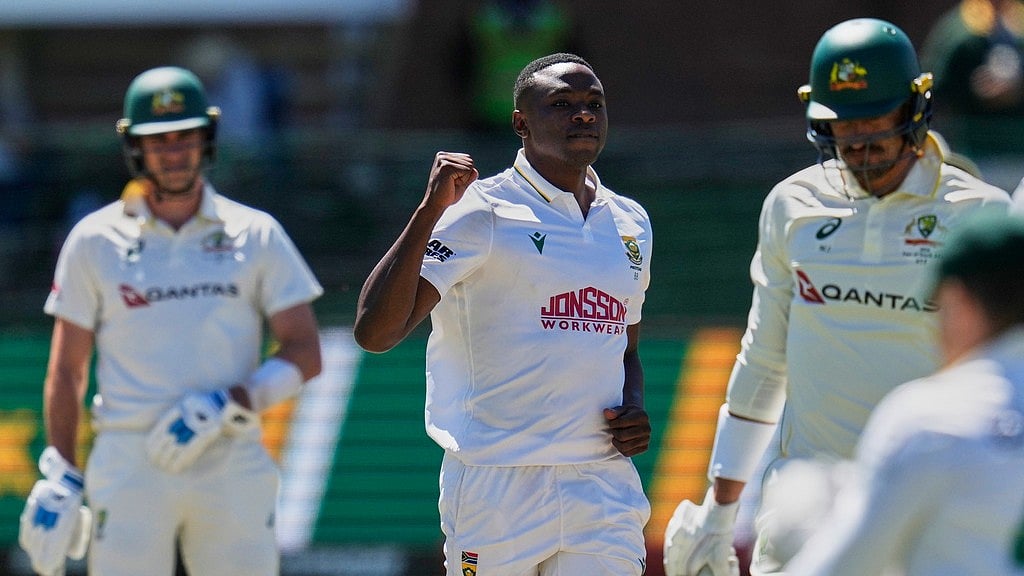 South Africa's Kagiso Rabada. Centre, celebrates the wicket of Australia's Mitchell Starc, on day four of the second cricket test match between South Africa and Australia, in Gqeberha, South Africa. - Themba Hadebe/X