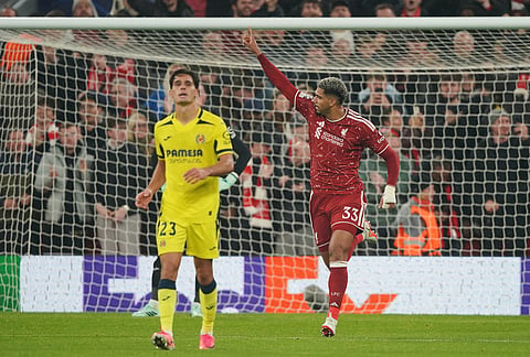 Liverpool's Ronald Araujo, right, celebrates after scoring his side's second goal during the Champions League opening phase soccer match between Liverpool and Villarreal in Liverpool, England, Tuesday, Oct. 20, 2026. 
