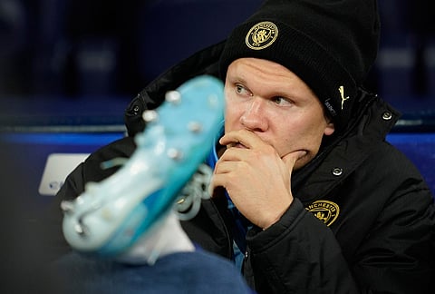 Manchester City's Erling Haaland sits on the bench before the Champions League soccer match between Manchester City and AEK Athens in Manchester, England, Tuesday, Oct. 20, 2026.