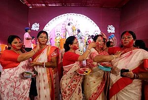| Photo: PTI : Women participate in the 'Sindoor Khela' ritual a day after 'Vijaya Dashami' celebrations, near Prayagraj, Uttar Pradesh, Wednesday, Oct. 21, 2026.