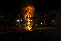| Photo: PTI/Arun Sharma : A cockroach effigy is set ablaze at Ramlila ground as part of Dussehra festival celebrations, in New Delhi.
