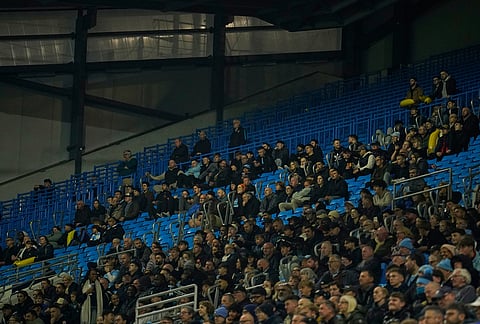 Half-empty stand is seen during the Champions League soccer match between Manchester City and AEK Athens in Manchester, England, Tuesday, Oct. 20, 2026. 