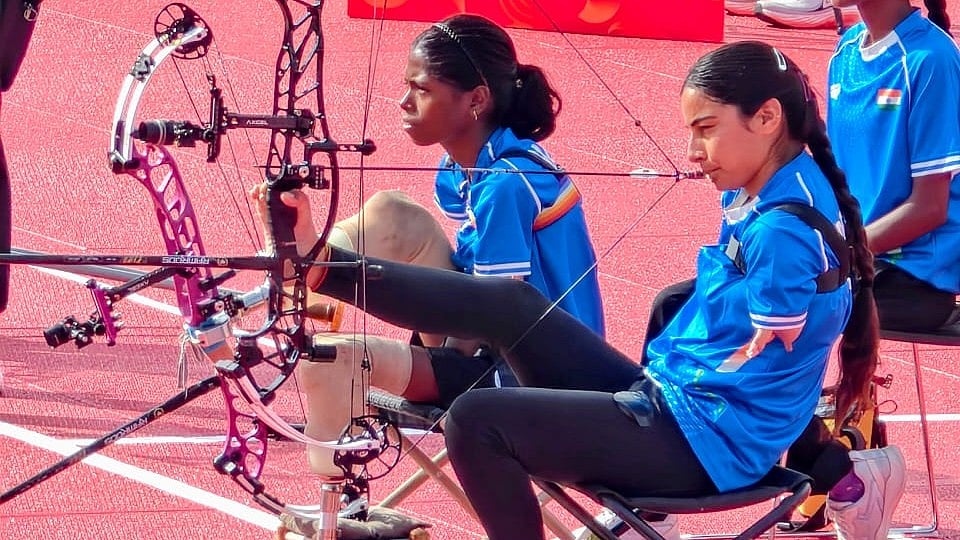 Sheetal Devi (Right) and Payal Nag in action during the para archery women's doubles final at the Asian Para Games 2026 - | Photo: SAI Media