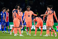 PSG Thrash Barcelona 4-2 In Champions League Thriller As Doue, Vitinha Shine | Photo: AP/Teresa Suarez : Barcelona's Lamine Yamal, center, is dejected at the end of the Champions League opening phase soccer match between Paris Saint-Germain and FC Barcelona in Paris, Tuesday, Oct. 20, 2026.