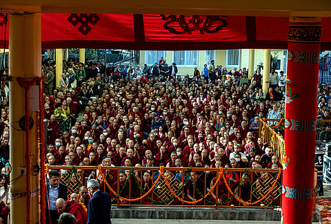 Tibetan Buddhist monks during a prayer gathering organized for the long life of Tibetan spiritual leader the Dalai Lama, in McLeod Ganj, Dharamshala, Himachal Pradesh.