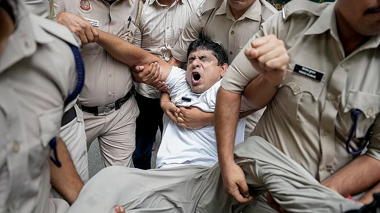 Police personnel detain Indian Youth Congress (IYC) National President Uday Bhanu Chib during a protest - | Photo: PTI/Ravi Choudhary