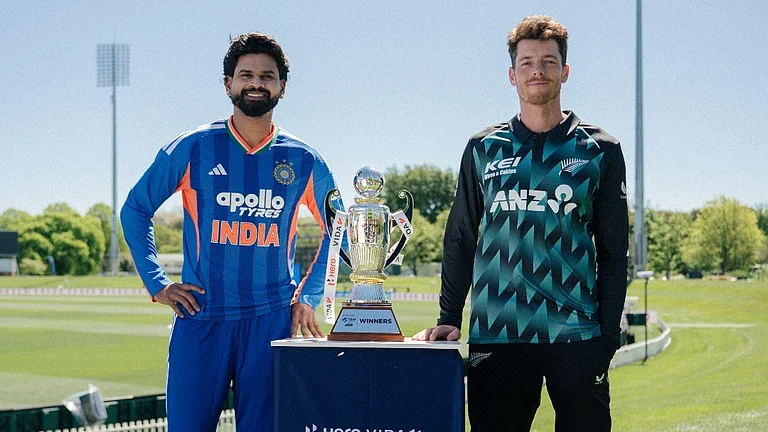 Shreyas Iyer and Mitchell Santner posing with the trophy ahead of the India vs New Zealand 5-match T20I series - X/Blackcaps