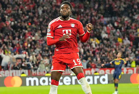 Bayern's Alphonso Davies celebrates after scoring first goal during the UEFA Champions League soccer match between Bayern and Arsenal in Munich Germany, Wednesday, Oct. 21, 2026. 