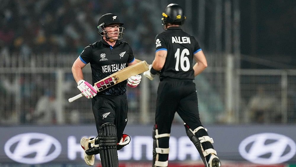 New Zealand's Tim Seifert, left, and batting partner Finn Allen run between the wickets during the first T20 World Cup cricket semifinal match between New Zealand and South Africa in Kolkata. - | Photo: AP/Bikas Das