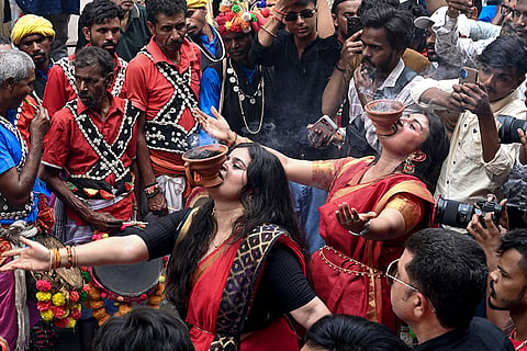 Women perform 'Dhunuchi' dance during the ninth day of the Durga Puja festival, in Jabalpur, Madhya Pradesh, Tuesday, Oct. 20, 2026.