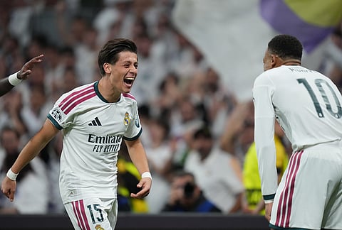 Real Madrid's Arda Guler celebrates after scoring his side's second goal during the Champions League opening phase soccer match between Real Madrid and Leipzig in Madrid, Wednesday, Oct. 21, 2026. 

