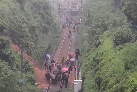 Debris clearance work underway after a landslide near the Parassala railway station in this district derailed the locomotive of the Bilaspur-Tirunelveli Express, disrupting train services, with the Railways cancelling six passenger trains and partially cancelling two express services, in Thiruvananthapuram, Keralam.