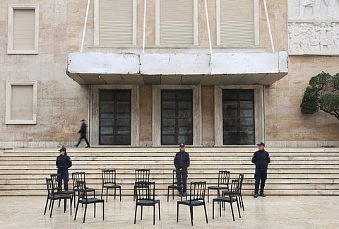 Chairs set up by the prime minister's office for a proposed "dialogue" are placed outside the Prime Minister's Office and government headquarters following several days of anti-government protests that turned violent in Tirana, Albania, Wednesday, Oct. 21, 2026. 