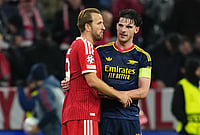 Rice Rescues Gunners In Munich: Arsenal Fight Back To Claim Thrilling 2-2 UEFA Champions League Draw Against Bayern | Photo: AP/Martin Meissner : Bayern's Harry Kane, left, and Arsenal's Declan Rice talk after the UEFA Champions League soccer match between Bayern and Arsenal in Munich Germany, Wednesday, Oct. 21, 2026.