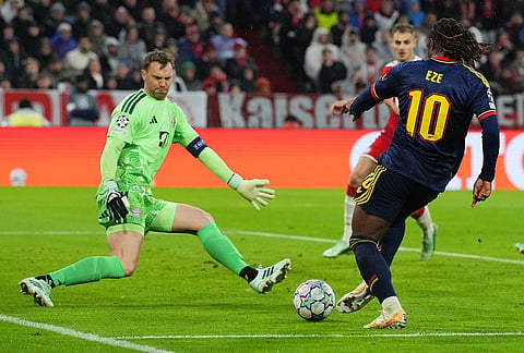Bayern's goalkeeper Manuel Neuer saves shot by Arsenal's Eberechi Eze during the UEFA Champions League soccer match between Bayern and Arsenal in Munich Germany, Wednesday, Oct. 21, 2026. 
