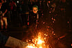 In Photos: Anti-Government Protests Escalate Into Clashes In Albania | Photo: AP/Hameraldi Agolli : Protesters gather around a fire during an anti-government protest in Tirana, Albania, Wednesday, Oct. 21, 2026.