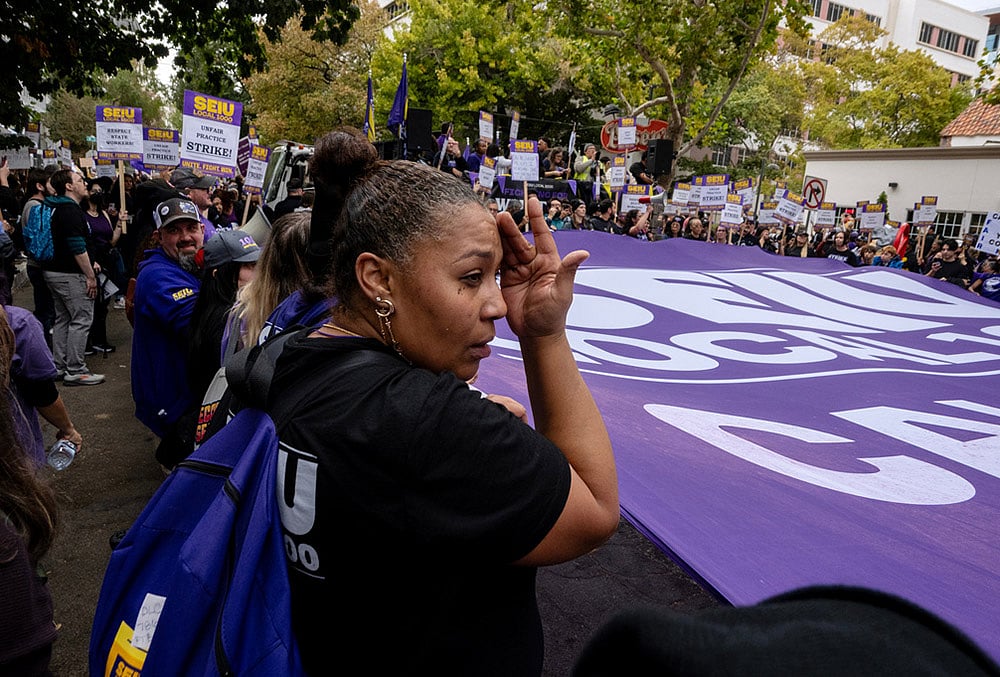 | Photo: AP/Jose Luis Villegas : Members of SEIU Local 1000 march near the state capitol during a one-day strike on Wednesday, Oct. 21, 2026, in Sacramento, California. 
