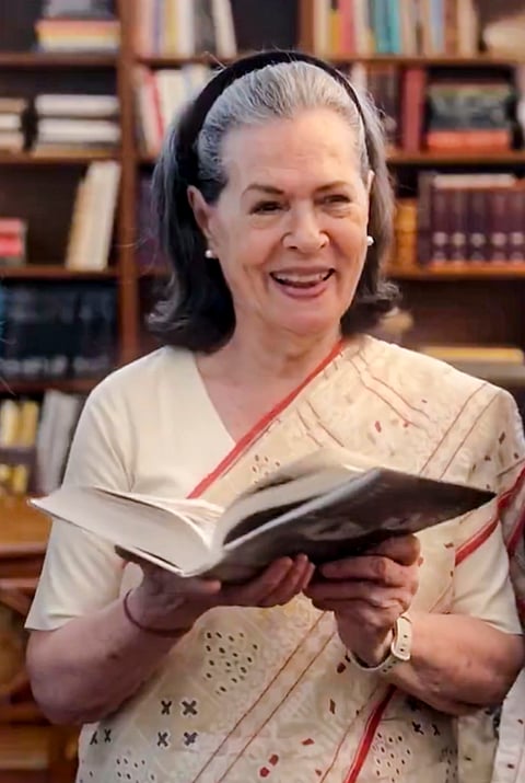 Congress Parliamentary Party Chairperson (CPP) and MP Sonia Gandhi holds her upcoming book 'Belonging: A Journey of Love' as she makes her Instagram debut, in New Delhi. 