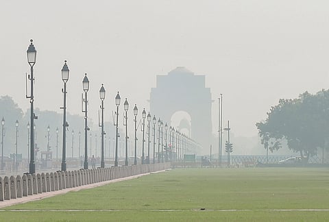 A layer of smog engulfs the India Gate on a cold morning, in New Delhi, Wednesday, Oct. 21, 2026. 
