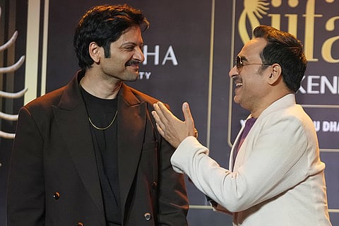 Bollywood actors Ali Fazal, left, and Pankaj Tripathi share a light moment during a press conference to announce the dates and venue for the 2027 International Indian Film Academy (IIFA) Awards in Mumbai, India, Thursday, Oct. 22, 2026.