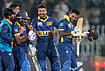 | Photo: AP/Anjum Naveed : Sri Lanka's Janith Liyanage, right, and Asitha Fernando, third left, celebrates with teammates after winning the tri-series one-day international cricket match against England, in Rawalpindi, Pakistan, Thursday, Oct. 22, 2026. 