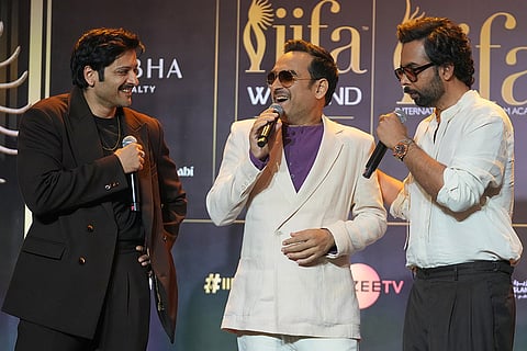 Bollywood actors Ali Fazal, left, Pankaj Tripathi, centre, and Abhishek Banerjee share a light moment during a press conference to announce the dates and venue for the 2027 International Indian Film Academy (IIFA) Awards in Mumbai, India, Thursday, Oct. 22, 2026.