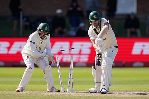 Australia's Scott Boland, right, is bowled by South Africa's Wiaan Mulder on day five of the second cricket test match between South Africa and Australia, in Gqeberha, South Africa, Thursday, Oct. 22, 2026.