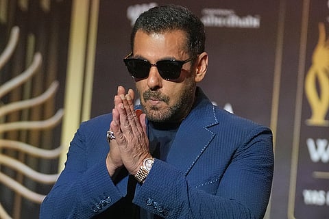 Bollywood actor Salman Khan gestures in greeting as he leaves a press conference announcing the dates and venue for the 2027 International Indian Film Academy (IIFA) Awards in Mumbai, India, Thursday, Oct. 22, 2026.