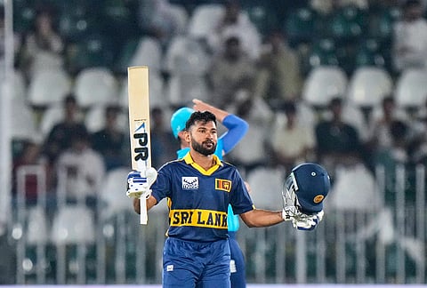 Sri Lanka's Pavan Rathnayake celebrates after scoring century during the tri-series one-day international cricket match between Sri Lanka and England, in Rawalpindi, Pakistan, Thursday, Oct. 22, 2026.  
