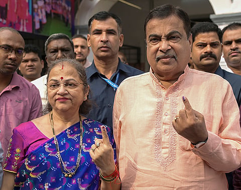 Union Minister Nitin Gadkari along with his wife Kanchan Gadkari show their ink-marked fingers after casting their vote for the five Teachers’ and Graduates’ seats of the Maharashtra Legislative Council, in Nagpur.