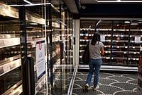 In Photos: Empty Shelves, Police Deployment As Italy Deals With Continuing Protest | Photo: Alessandro Garofalo/LaPresse via AP : A woman looks at empty shelves in a supermarket following truckers protesting against high fuel prices, in Naples, Italy, Thursday Oct. 22, 2026.