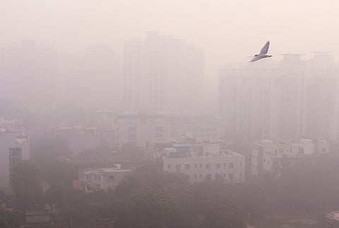 A view of the city skyline shrouded in haze amid poor visibility, in Gurugram, Haryana, Thursday, Oct. 22, 2026. 
