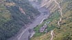 UN Climate Fund Sets Aside $20 Million For Nepal, But Billions Remain Needed | Photo: PTI/Abhishek Maharjan : An aerial view shows mudslide debris and floodwaters overflowing the Budhi Gandaki river following a sudden flash flood triggered by a suspected landslide in the Chekampar area, in Gorkha district, Nepal, Sunday, Oct. 11, 2026.
