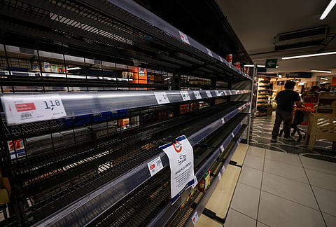 Empty shelves in a supermarket following truckers protesting against high fuel prices, in Naples, Italy, Thursday Oct. 22, 2026. 
