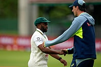 Temba Bavuma, Marco Jansen Star As South Africa Hand Australia Crushing Defeat In 2nd Test | Photo: AP/Themba Hadebe : South Africa's Temba Bavuma, left, shakes hand with Australia's Pat Cummins following the day five of the second cricket test match between South Africa and Australia, in Gqeberha, South Africa, Thursday, Oct. 22, 2026.