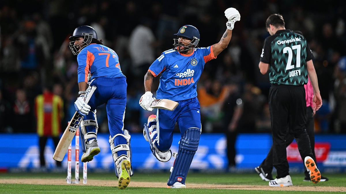 India's Nitish Kumar Reddy, center, and teammate Tilak Varma, left, celebrate after winning the second T20 cricket international between New Zealand and India in Christchurch, New Zealand, Saturday, Oct. 24, 2026 - (Andrew Cornaga/Photosport via AP)