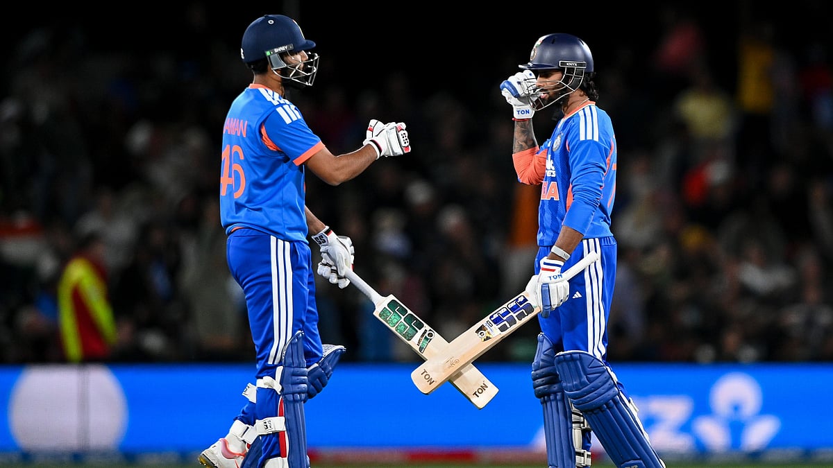 India's Naman Dhir, left, and teammate Tilak Varma gesture during the second T20 cricket international between New Zealand and India in Christchurch, New Zealand, Saturday, Oct. 24, 2026 - (John Davidson/Photosport via AP)