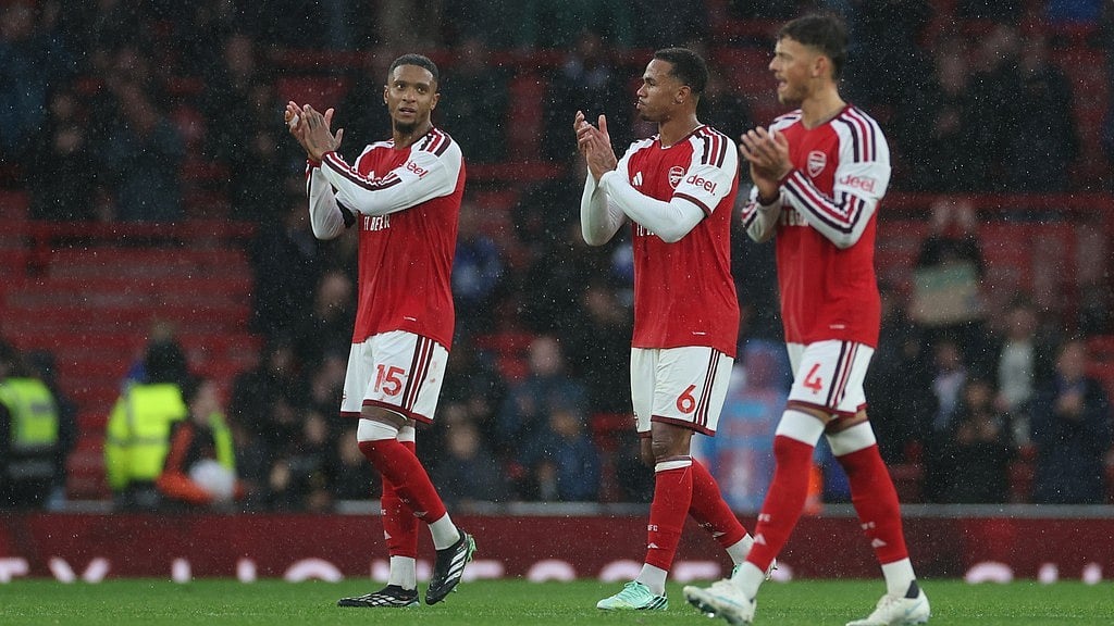 Arsenal's Ezri Konsa, left, Gabriel, center, and Ben White walk off the pitch after the English Premier League soccer match between Arsenal and Everton in London. - Ian Walton/AP Photo