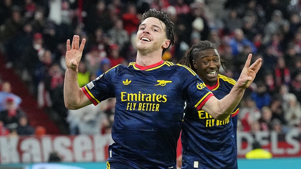 Arsenal's Declan Rice celebrates after scoring his side's second goal during the Champions League opening phase soccer match between Bayern and Arsenal in Munich, Germany. - AP Photo/Martin Meissner