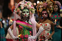 In Photos: Día de Muertos Parade Brings Colour, Costumes And Festive Spirit To Seattle Photo: AP/Lindsey Wasson : A group of women dressed as Catrinas participate in a parade during a Día de Muertos celebration at Pike Place Market, Friday, Oct. 23, 2026, in Seattle.