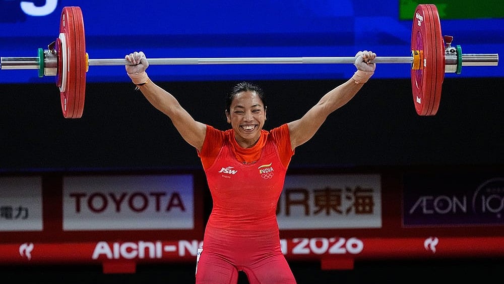 Mirabai Chanu Saikhom of India competes during the women's 49kg weightlifting final at the Asian Games in Nagoya, Japan, Wednesday, Sept. 23, 2026.  - | Photo: AP/Dita Alangkara