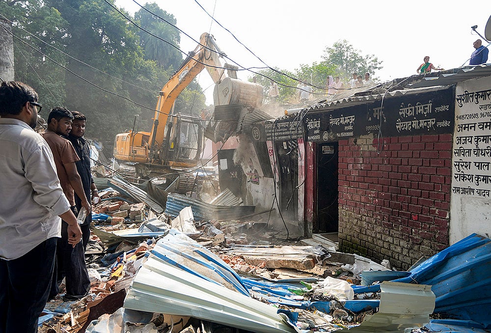 Municipal Corporation carry out a demolition drive of lawyers' chambers allegedly built illegally, following a High Court order, in Lucknow, Sunday, Oct. 25, 2026. 
 - | Photo: PTI/Nand Kumar