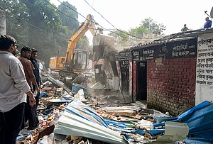 | Photo: PTI/Nand Kumar : Municipal Corporation carry out a demolition drive of lawyers' chambers allegedly built illegally, following a High Court order, in Lucknow, Sunday, Oct. 25, 2026.