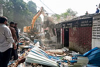 In Photos | Lucknow Civic Body Demolishes ‘Illegal’ Lawyers’ Chambers After High Court Order | Photo: PTI/Nand Kumar : Municipal Corporation carry out a demolition drive of lawyers' chambers allegedly built illegally, following a High Court order, in Lucknow, Sunday, Oct. 25, 2026.