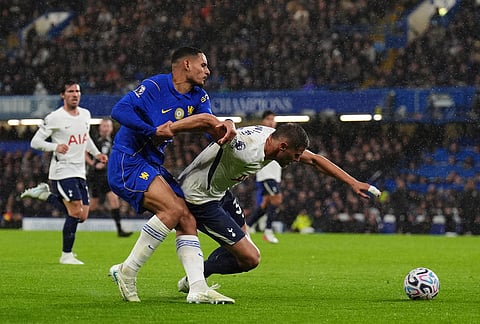 Chelsea's Maxence Lacroix, left, and Tottenham Hotspur's Micky van de Ven battle for the ball during the English Premier League soccer match between Chelsea and Tottenham Hotspur in London, Saturday, Oct. 24, 2026.  