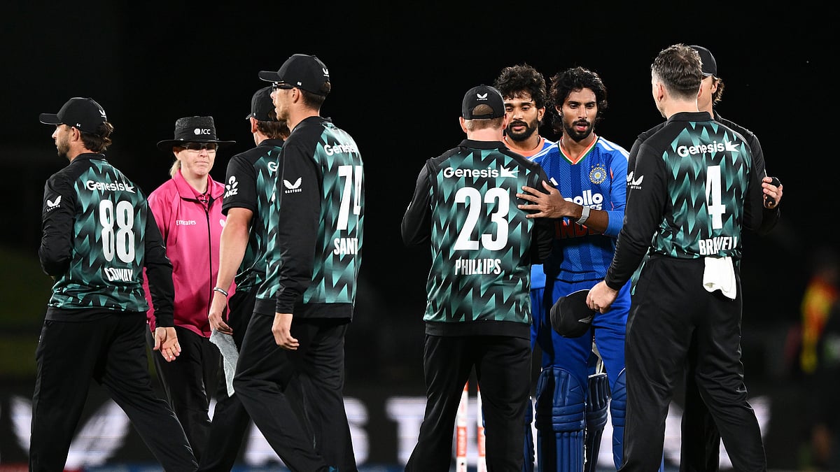 India's Tilak Varma, third right, shakes hands with New Zealand's players after winning the second T20 cricket international between New Zealand and India in Christchurch, New Zealand, Saturday, Oct. 24, 2026. - (Chris Symes/Photosport via AP)