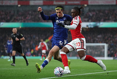 Everton's Merlin Roehl guards Arsenal's Eberechi Eze during the English Premier League soccer match between Arsenal and Everton in London, Saturday, Oct. 24, 2026.
