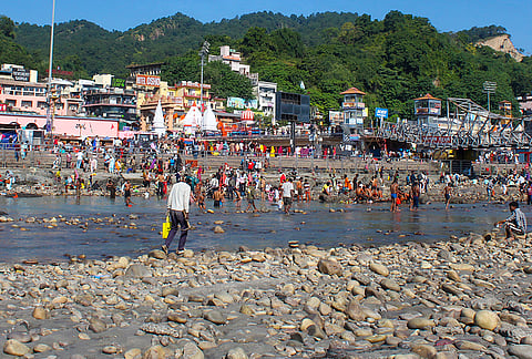 People gather at the banks of Har Ki Pauri, in Haridwar, Thursday, Oct. 22, 2026. The Ganga canal at Har Ki Pauri in Haridwar has been shut down for the next 18 days for annual maintenance and repair work, officials said on Wednesday. 
