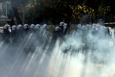 Riot police advance during an anti-government rally in Tirana, Albania, Saturday, Oct. 24, 2026. 